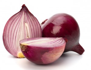 Red sliced onion  isolated on white background